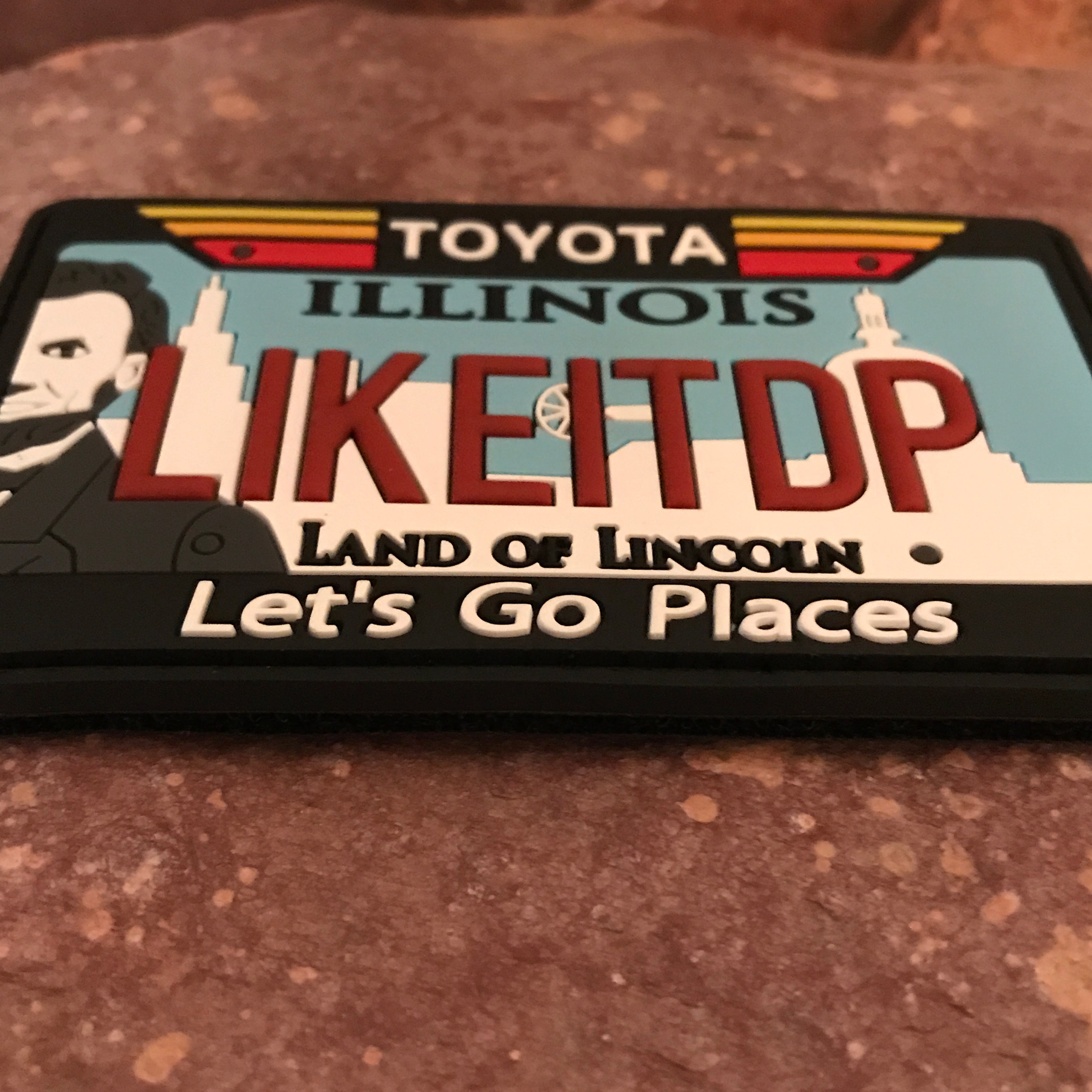 Illinois Toyota Morale Patch - Collectible 3D PVC State License Plate ~ Headliner Accessory ~ Travel Souvenir ~ Deep Dish Pizza Parody Gift