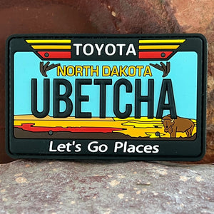 North Dakota Toyota Morale Patch Collectible 3D PVC State License Plate You Betcha Funny Northern Saying Headliner Accessory Travel Souvenir