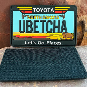 North Dakota Toyota Morale Patch Collectible 3D PVC State License Plate You Betcha Funny Northern Saying Headliner Accessory Travel Souvenir